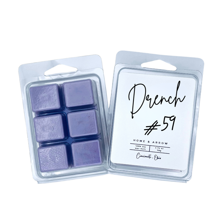 Set of six purple wax melts in a clear packaging with 'Drench #59' label on a white background.