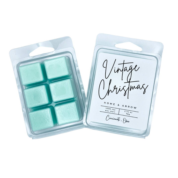 Vintage Christmas green soy wax melt in clamshell packaging on a white background fron Home & Arrow based in Cincinnati Ohio.