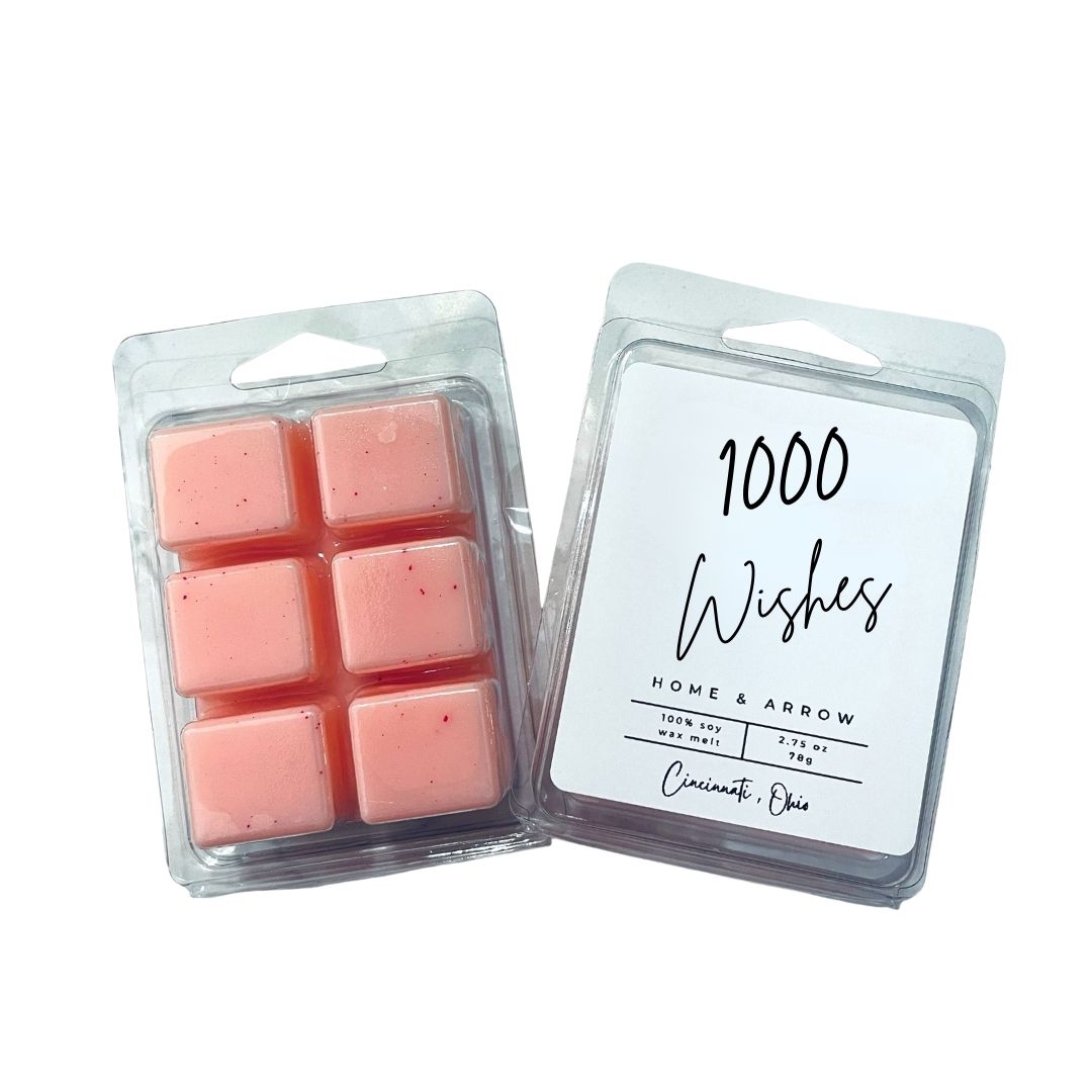 Pink wax melt clamshell labeled '1000 Wishes' on a plain white background.