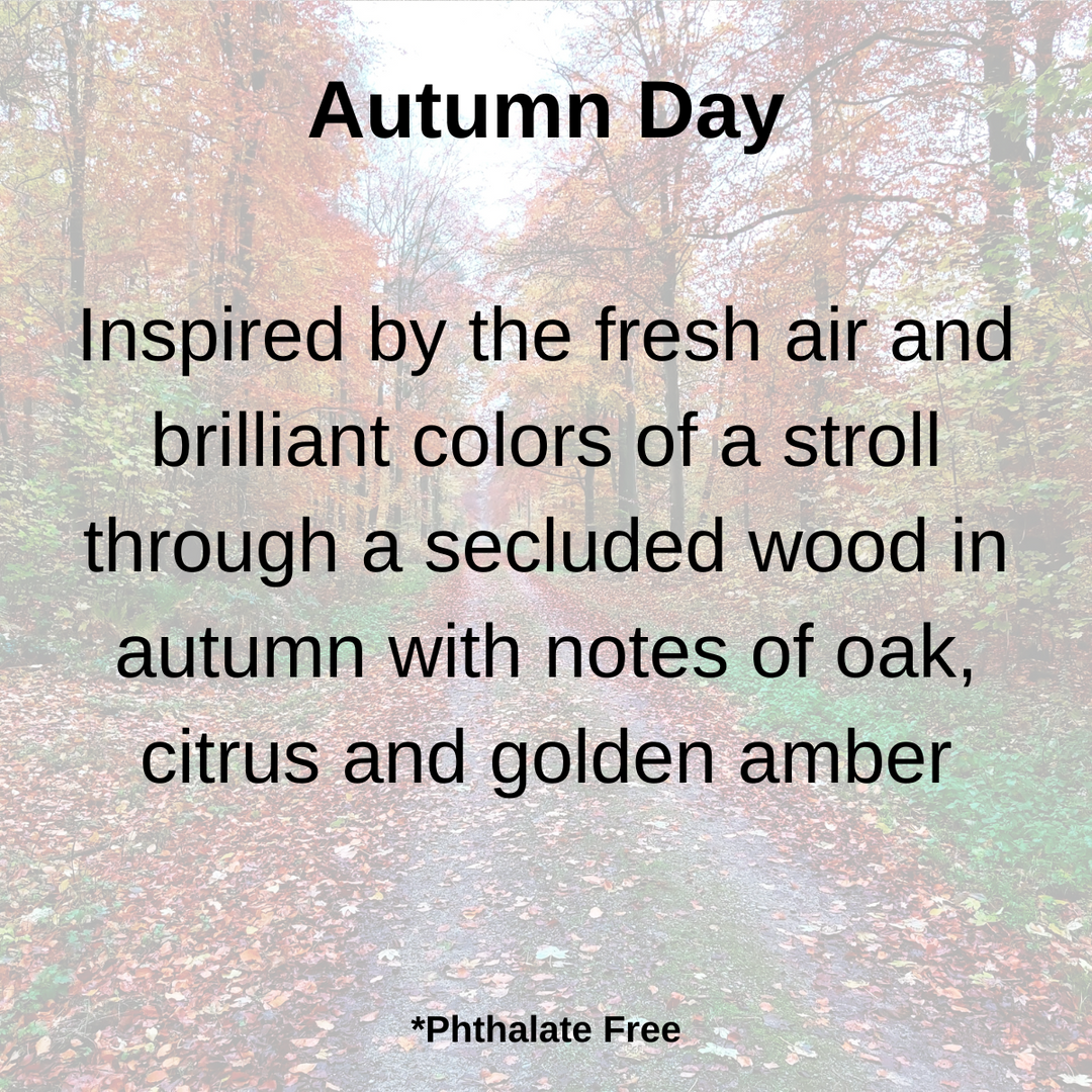 Autumn Day scent description with notes of oak, citrus, and golden amber displayed over a fall forest path background.