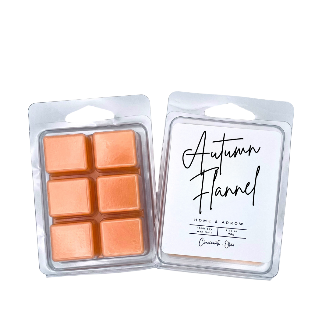 Autumn Flannel  orange soy wax melts in clamshell packaging on a white background from Home & Arrow based in Cincinnati, Ohio. 