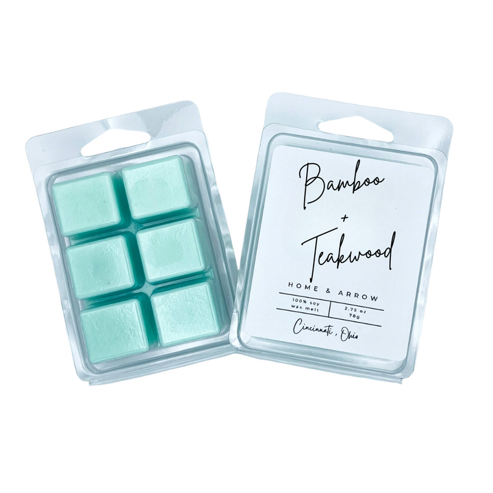 Bamboo + Teakwood teal soy wax melts in clamshell packaging on a white background from Home & Arrow based in Cincinnati, Ohio.