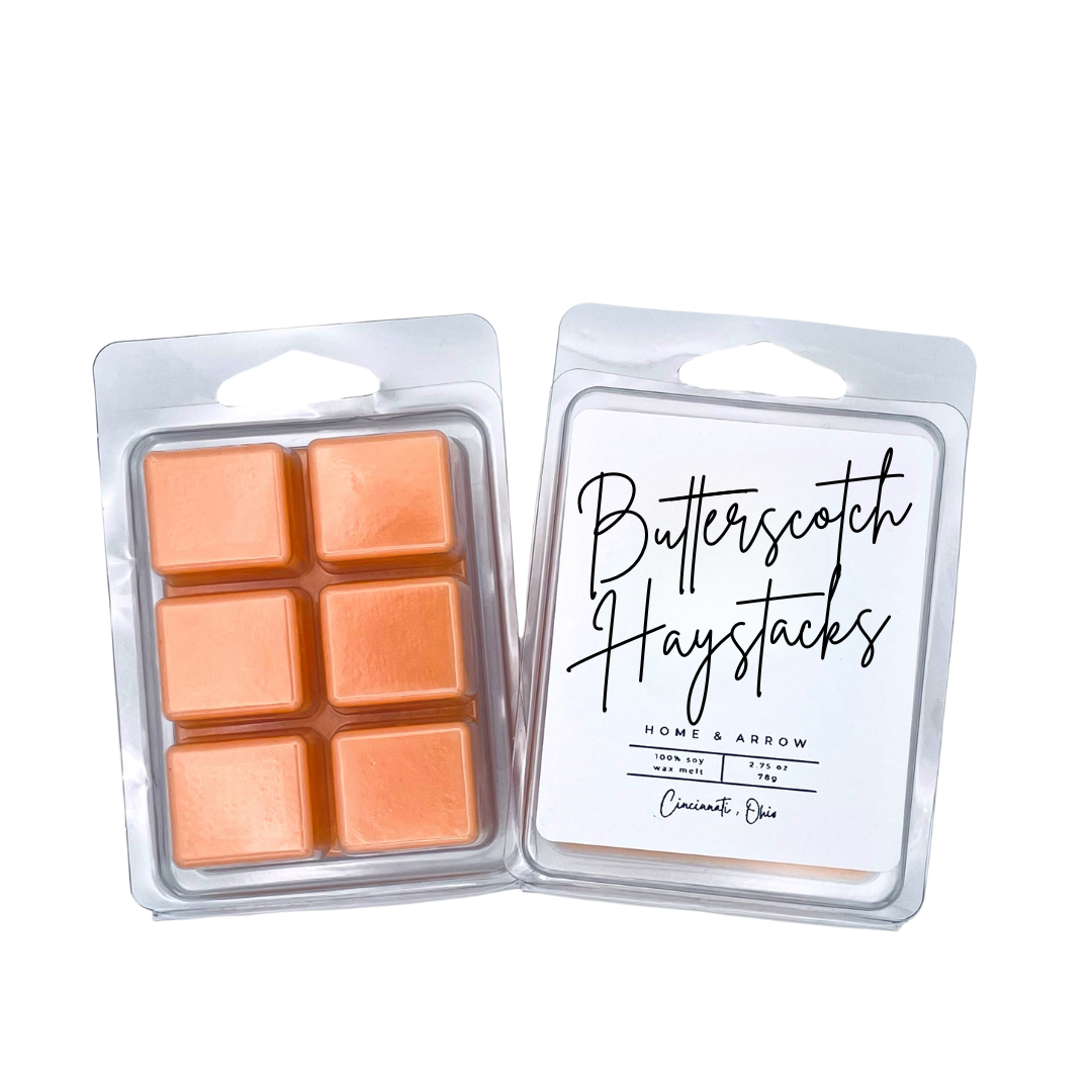 Butterscotch Haystacks orange soy wax melt in clamshell packaging on a white background fron Home & Arrow based in Cincinnati Ohio.