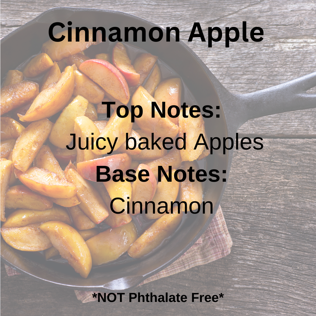 Baked apples in a skillet with cinnamon on a wooden surface, labeled 'Cinnamon Apple'.