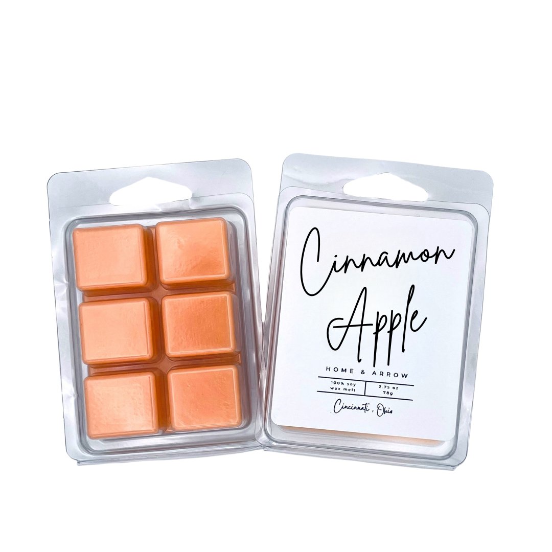 Cinnamon Apple orange soy wax melt in clamshell packaging on a white background from Home & Arrow based in Cincinnati Ohio.