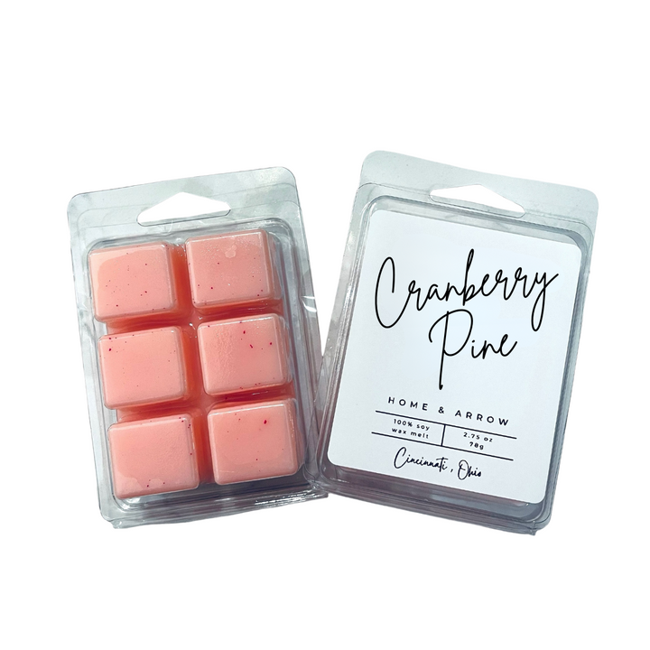 Cranberry Pine pink soy wax melt in clamshell packaging on a white background fron Home & Arrow based in Cincinnati Ohio.