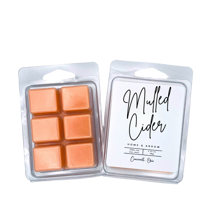 Mulled Cider orange soy wax melt in clamshell packaging on a white background from Home & Arrow based in Cincinnati Ohio.