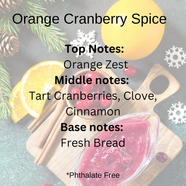 Orange Cranberry Spice scent notes: Orange zest, tart cranberries, clove, cinnamon, and fresh bread over a festive serving board topped with cranberries and oranges.