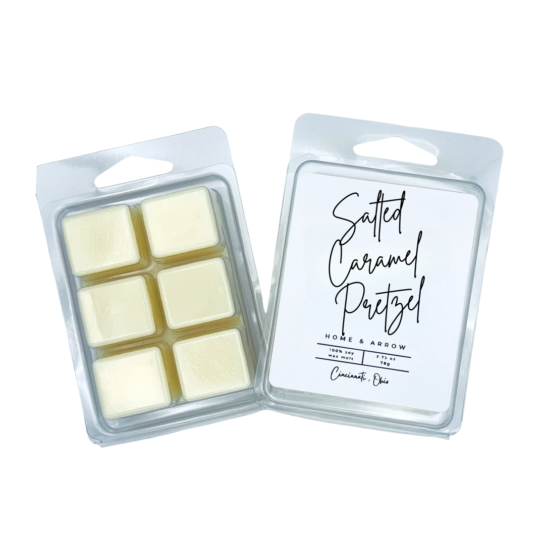 Salted Caramel Pretzel yellow soy wax melt in clamshell packaging on a white background fron Home & Arrow based in Cincinnati Ohio.