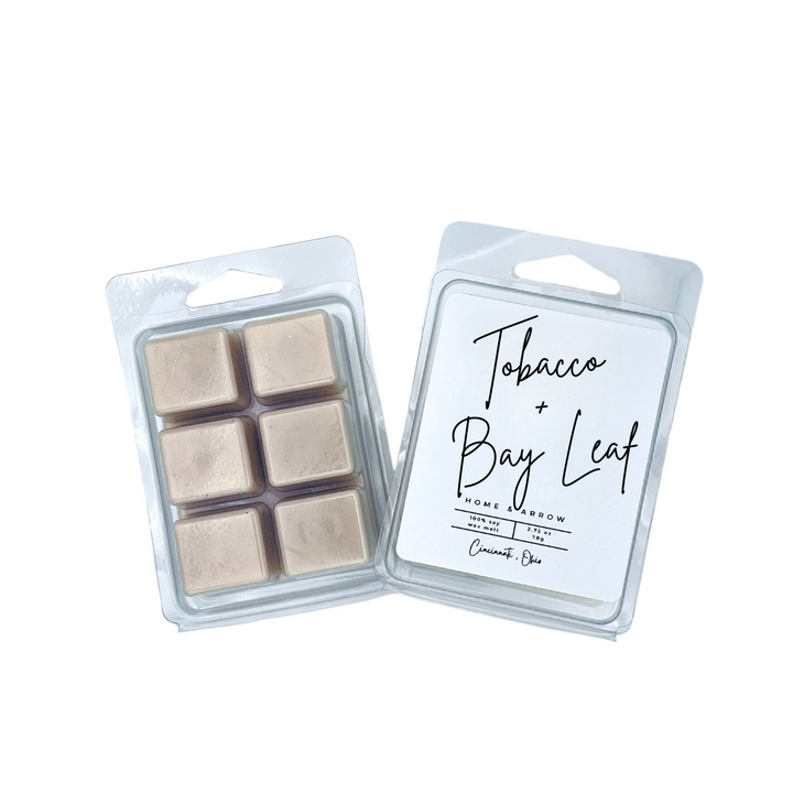 Tobacco + Bay Leaf tan soy wax melt in a clamshell package on a white background from Home & Arrow in Cincinnati, Ohio. 